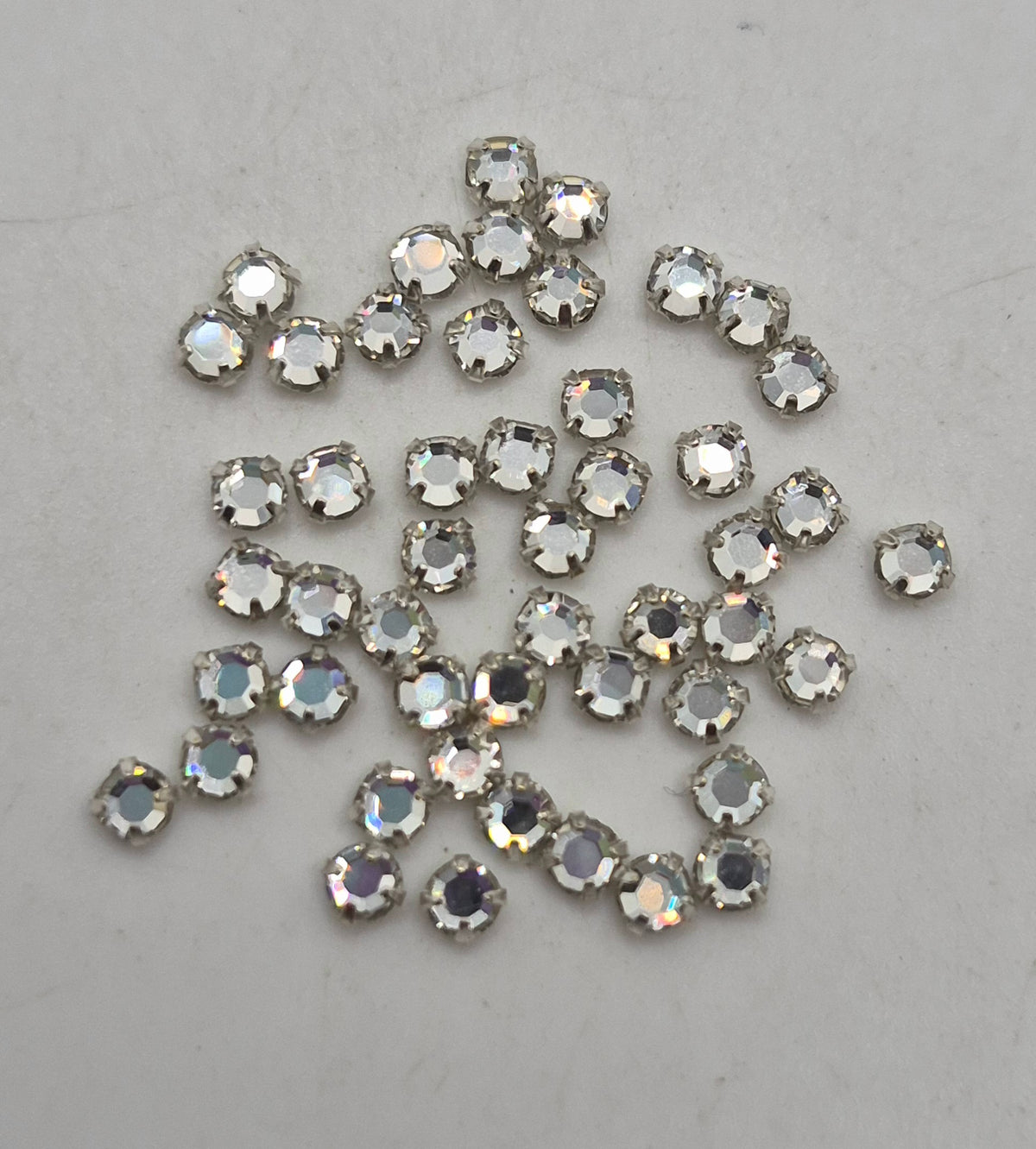 #2000 - Swarovski Crystal ss12 Rose Montees in Silver Plated Setting; 24pc per pack