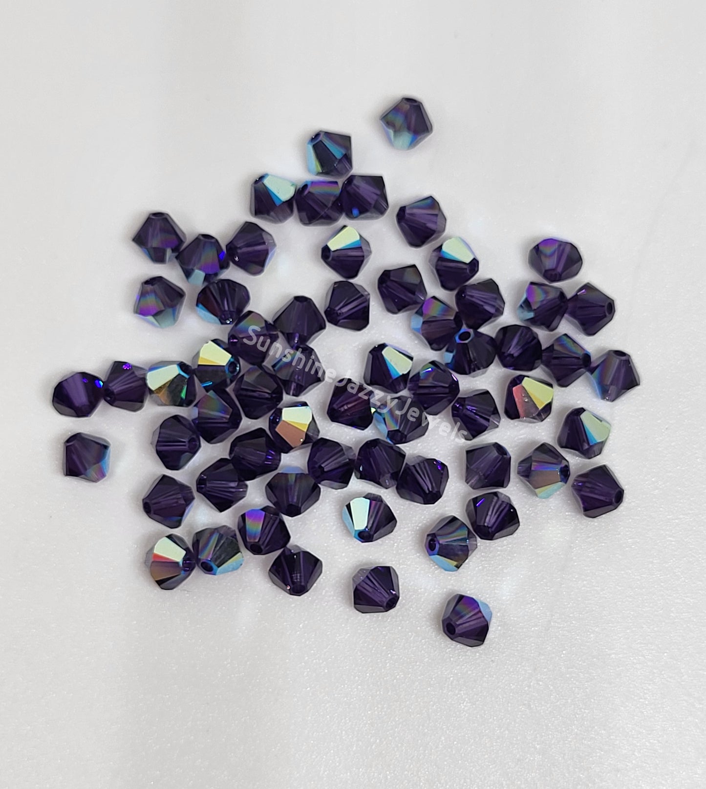 #5328 - Swarovski Crystal 4mm Bicone Beads w/ AB Finish