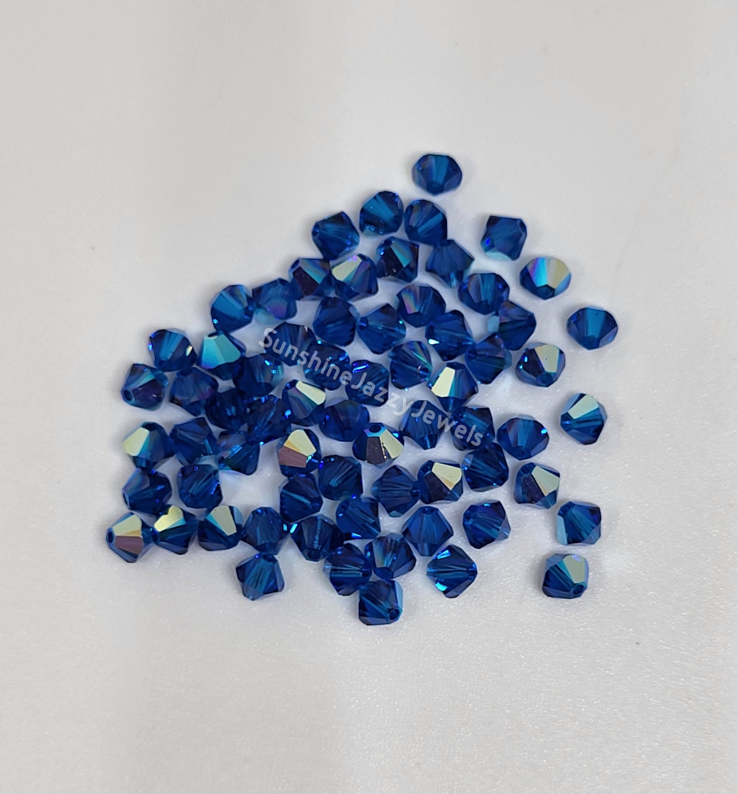 #5328 - Swarovski Crystal 4mm Bicone Beads w/ AB Finish