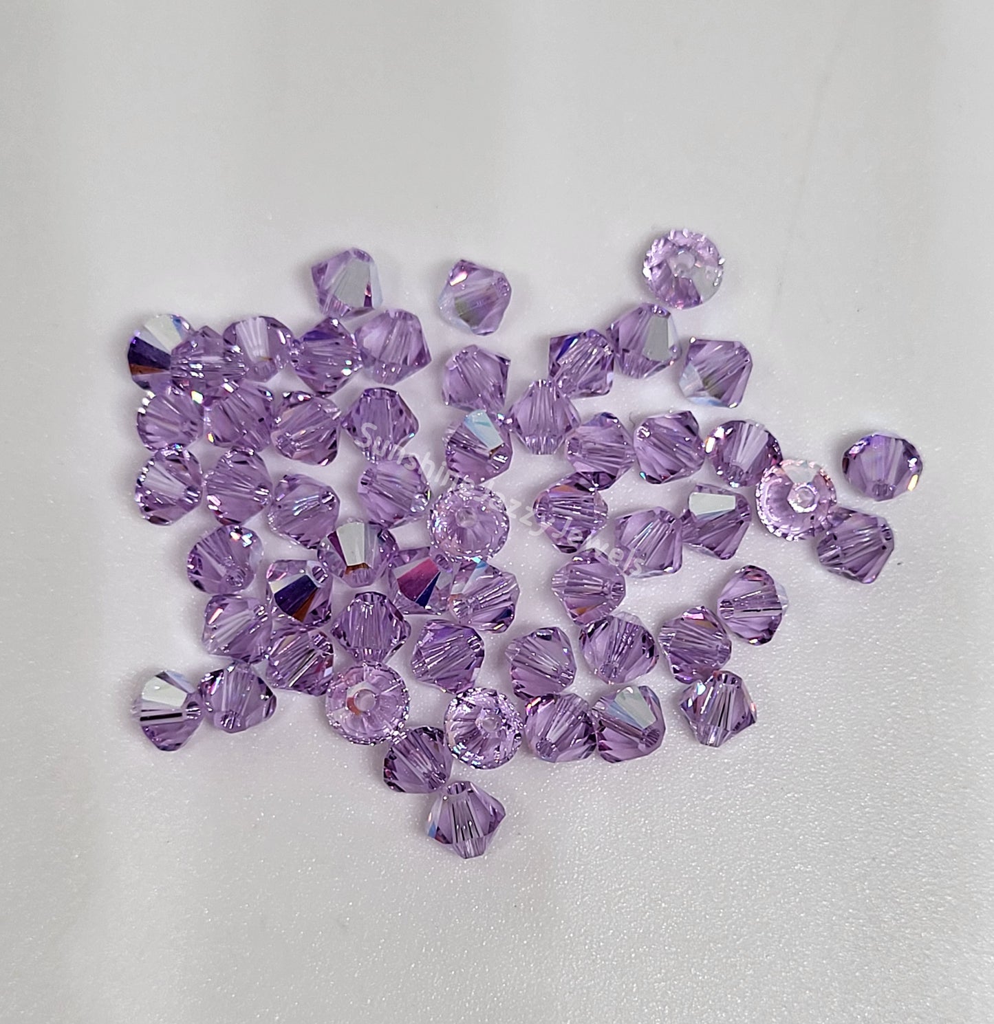 #5328 - Swarovski Crystal 4mm Bicone Beads w/ AB Finish