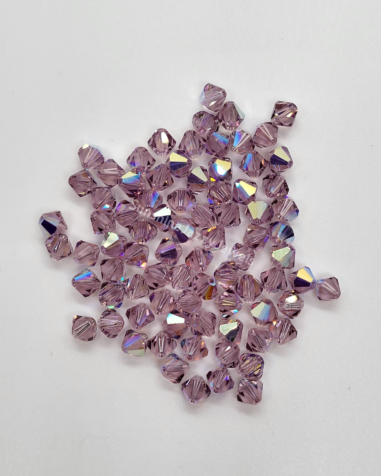 #5328 - Swarovski Crystal 4mm Bicone Beads w/ AB Finish