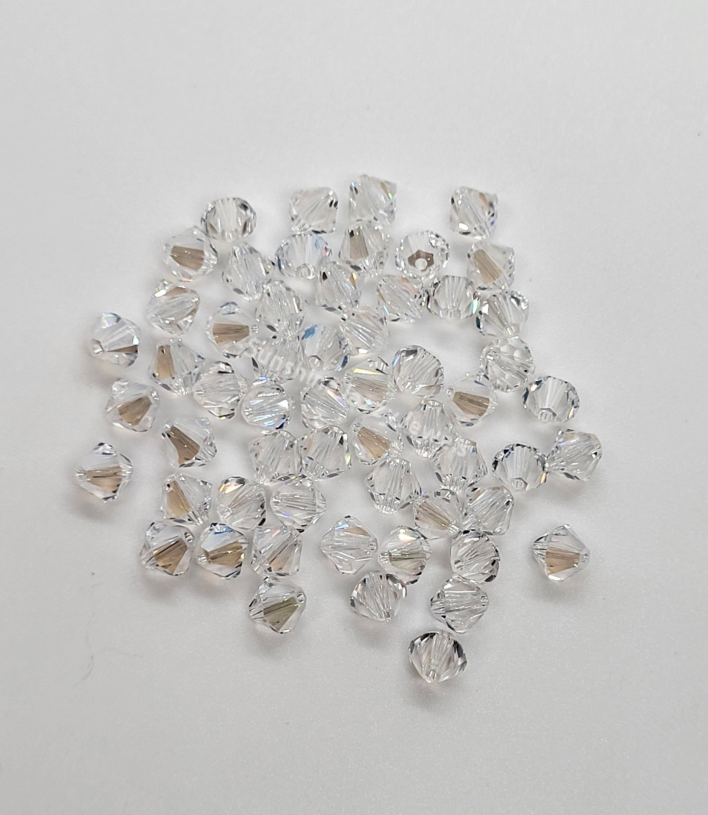 #5328 - Swarovski Crystal 6mm Bicone Beads; Crystal Effects