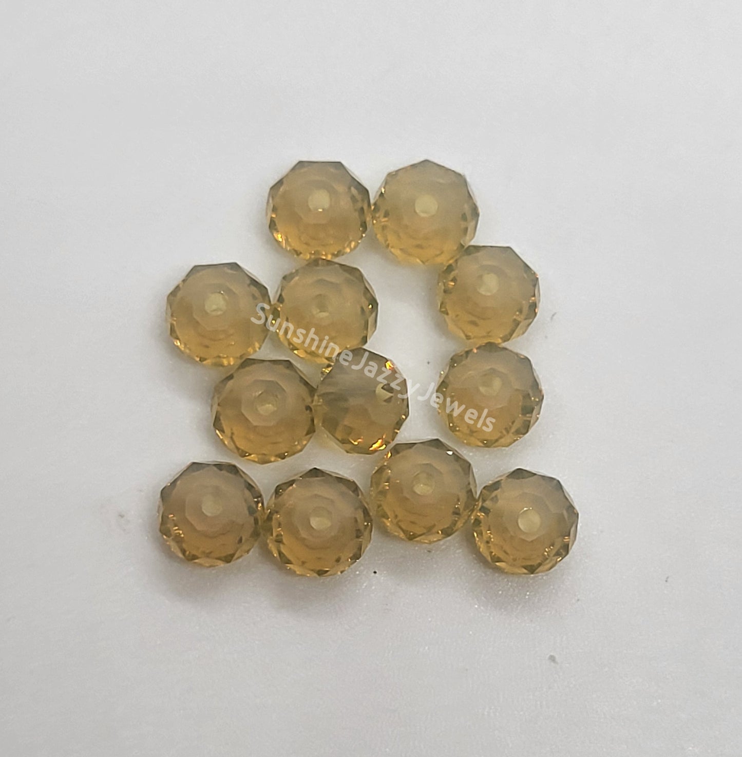 #5040 - Swarovski Crystal 6mm Briolette/ Donut Beads