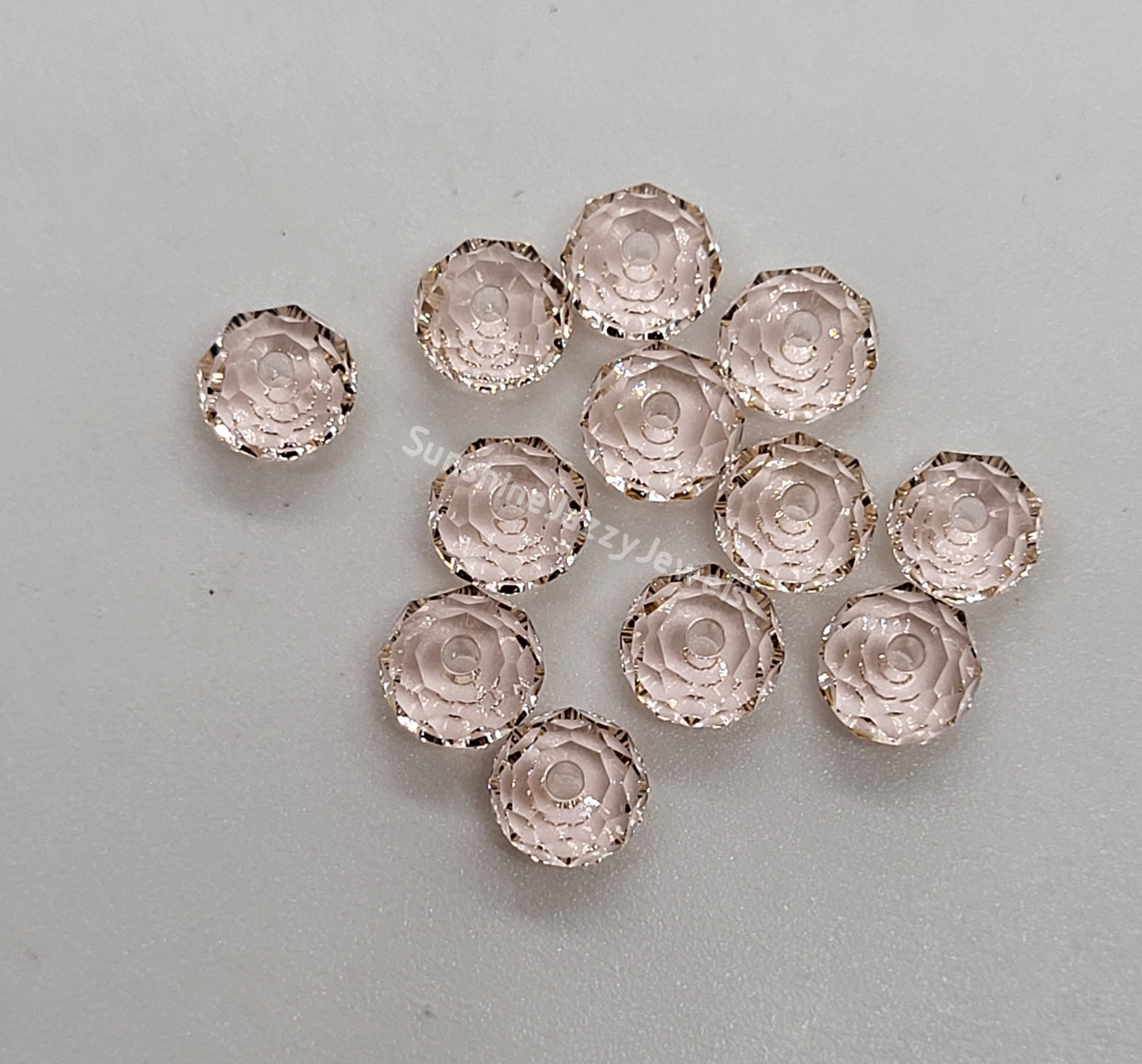 #5040 - Swarovski Crystal 6mm Briolette/ Donut Beads