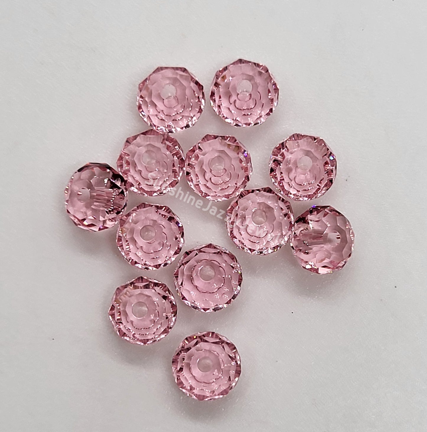 #5040 - Swarovski Crystal 6mm Briolette/ Donut Beads