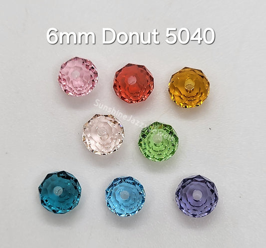 #5040 - Swarovski Crystal 6mm Briolette/ Donut Beads