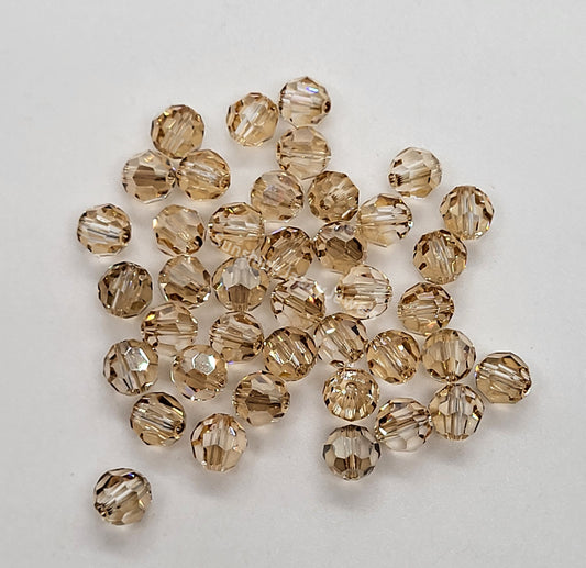 #5000 - Swarovski Crystal 6mm Faceted Round Beads w/ Crystal Effect
