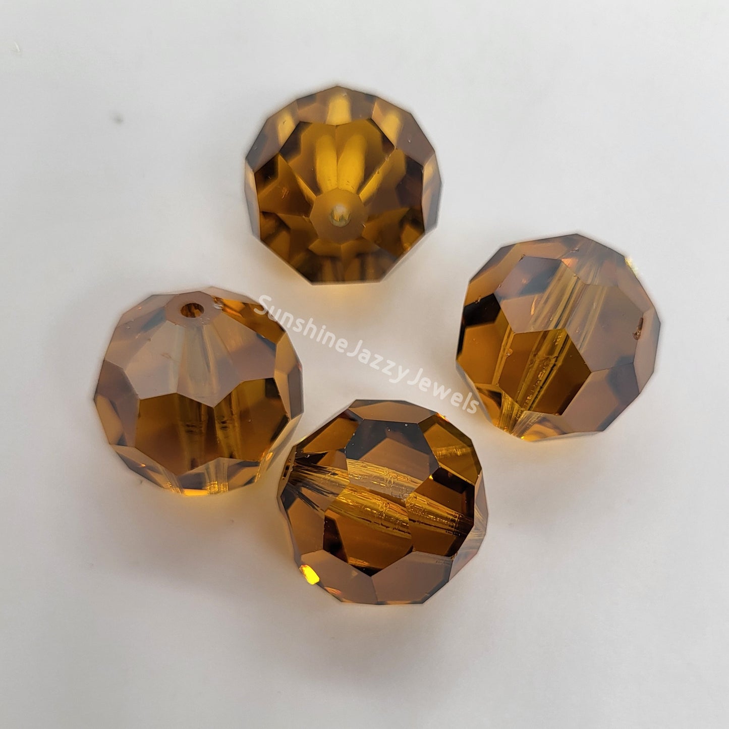 #5000 - Swarovski Crystal 16mm Faceted Round Beads