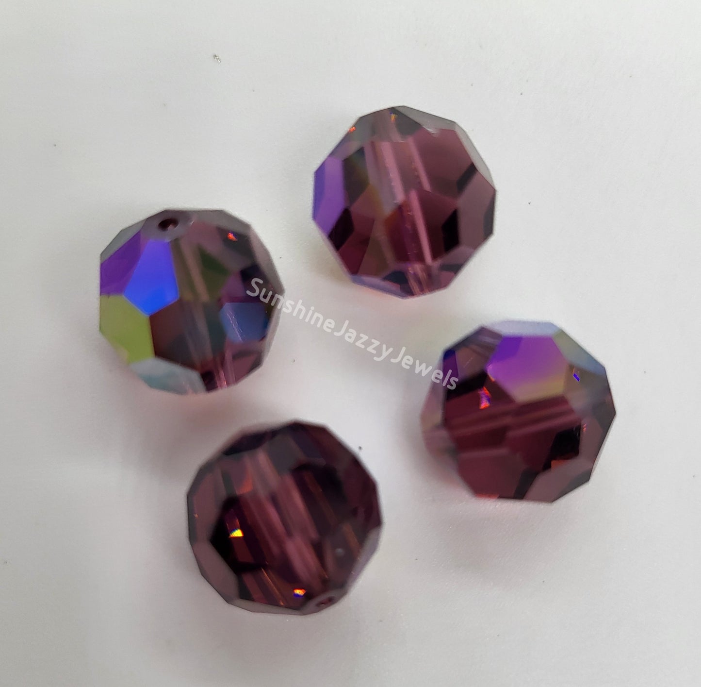 #5000 - Swarovski Crystal 16mm Faceted Round Beads