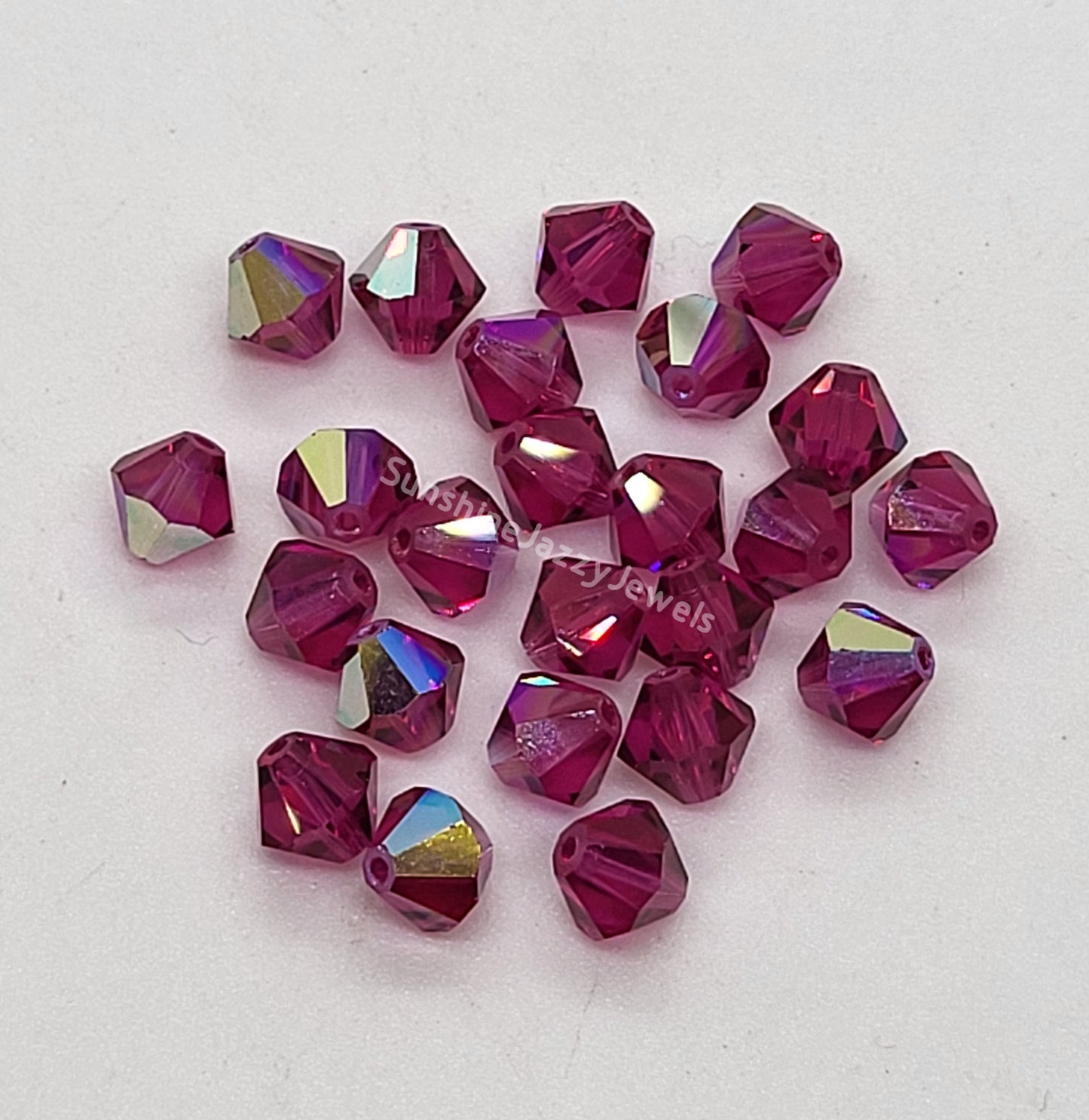 #5328 - Swarovski Crystal 6mm Bicone w/ AB Finish; 12pc per pack