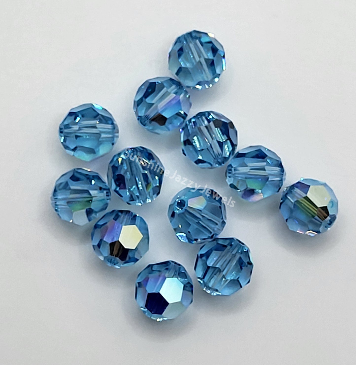 #5000 - Swarovski Crystal 8mm Round Beads w/ AB Finish