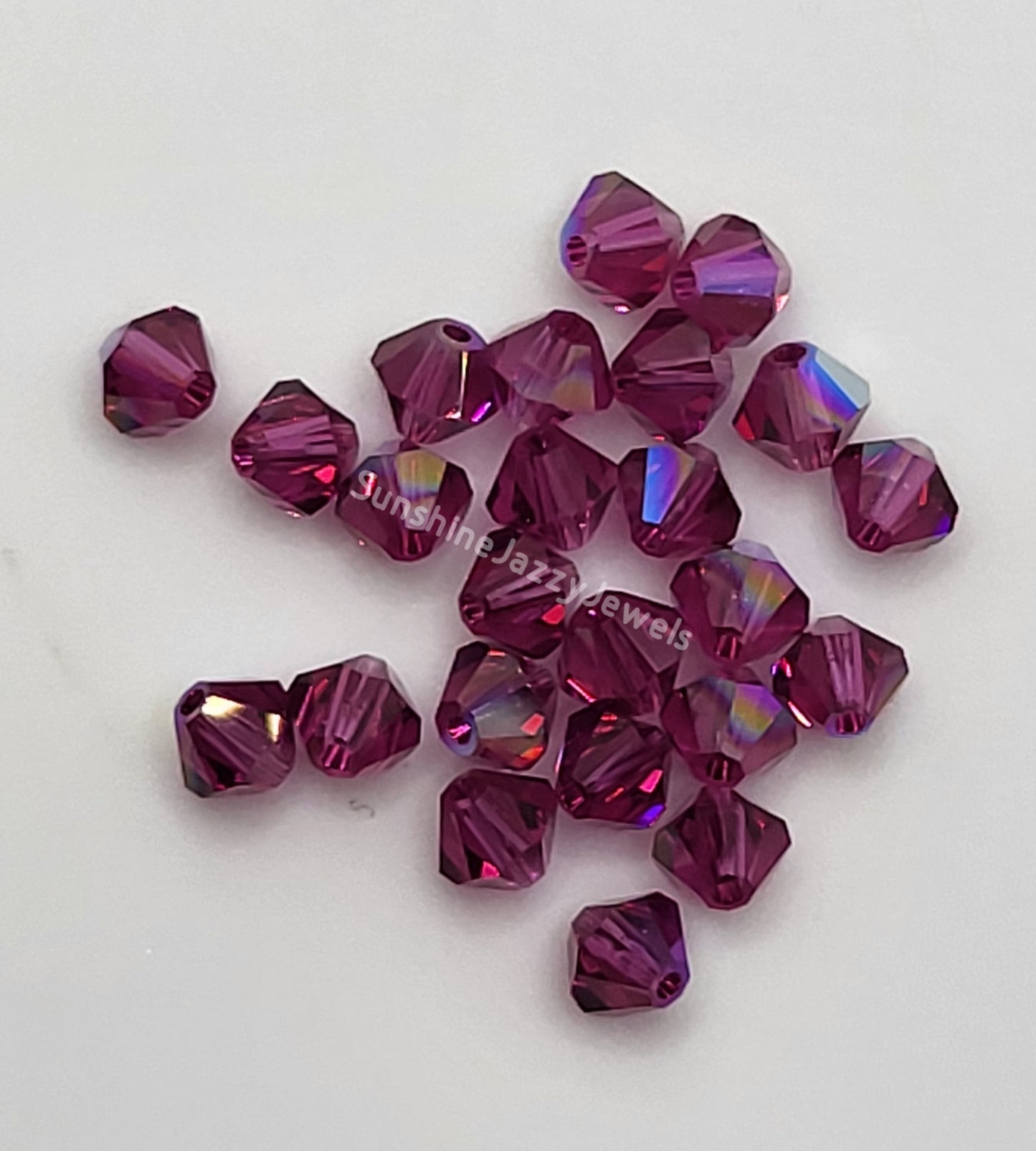 #5328 - Swarovski Crystal 4mm Bicone Beads w/ AB Finish