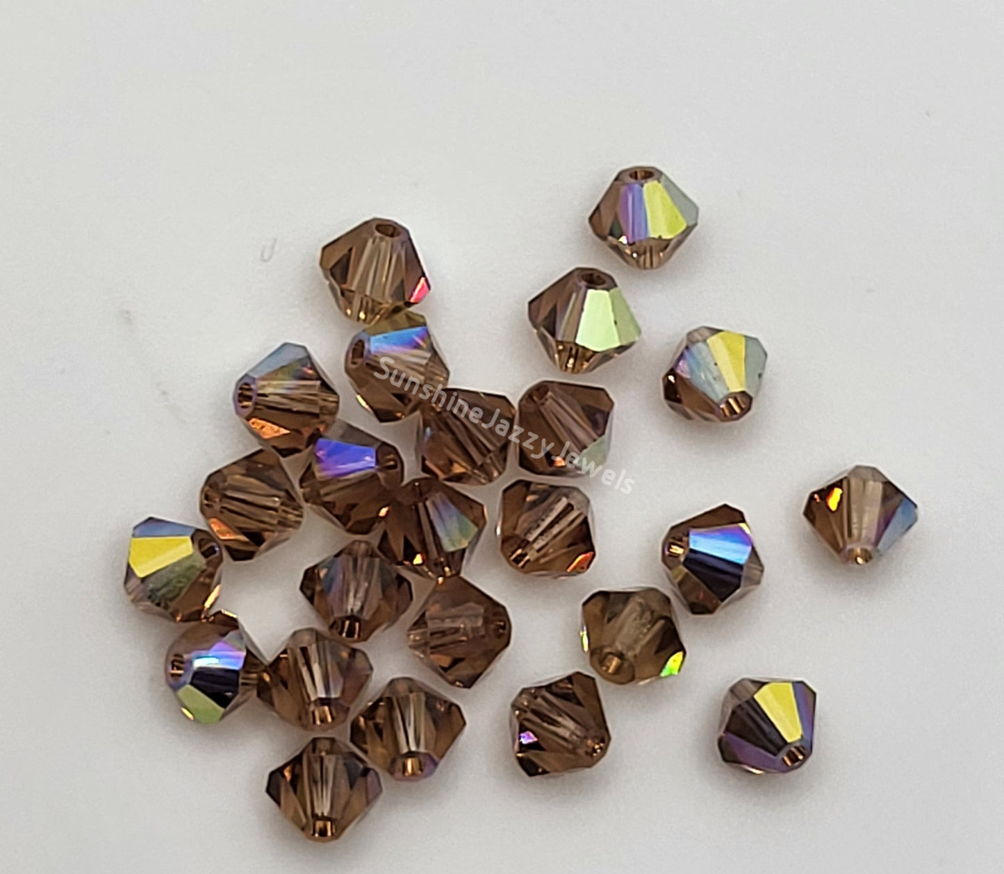 #5328 - Swarovski Crystal 4mm Bicone Beads w/ AB Finish