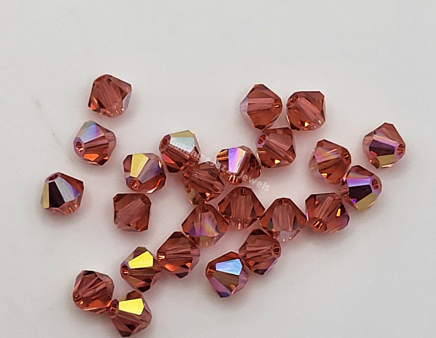 #5328 - Swarovski Crystal 4mm Bicone Beads w/ AB Finish