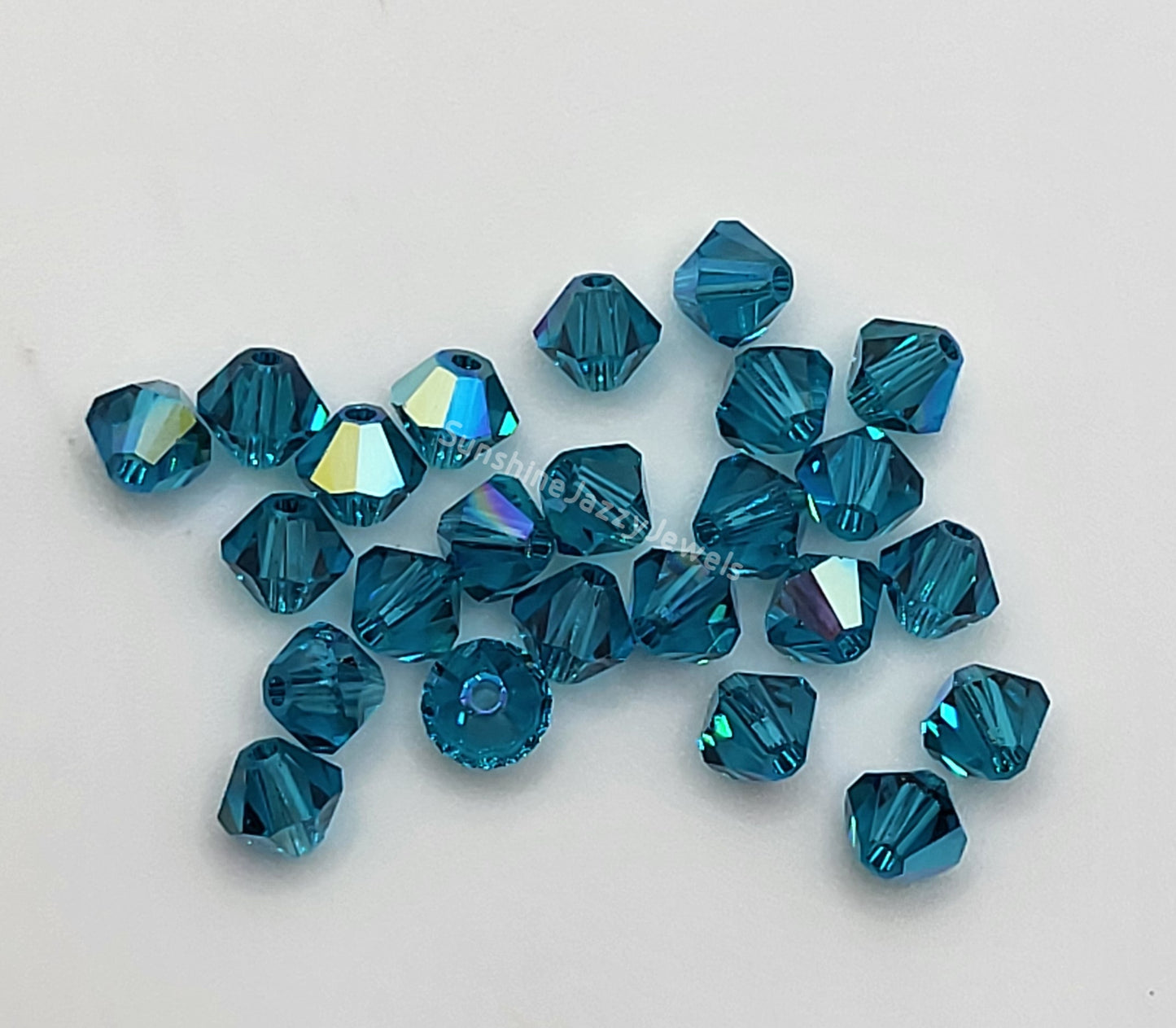 #5328 - Swarovski Crystal 4mm Bicone Beads w/ AB Finish