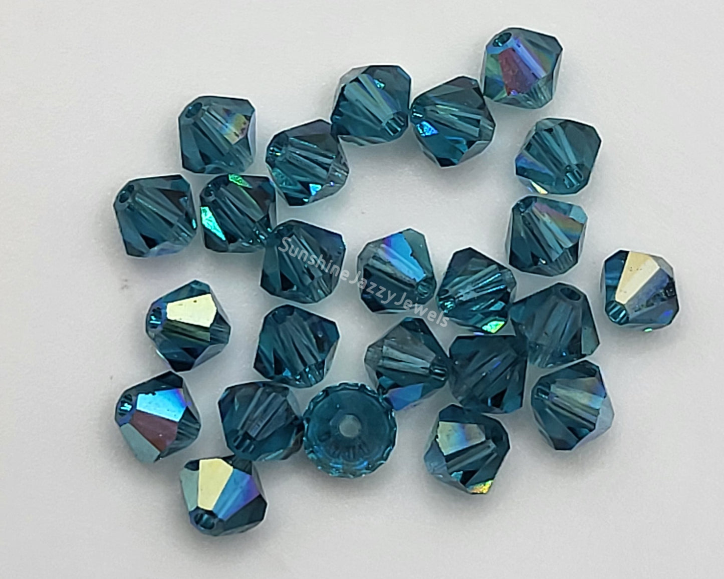 #5328 - Swarovski Crystal 4mm Bicone Beads w/ AB Finish