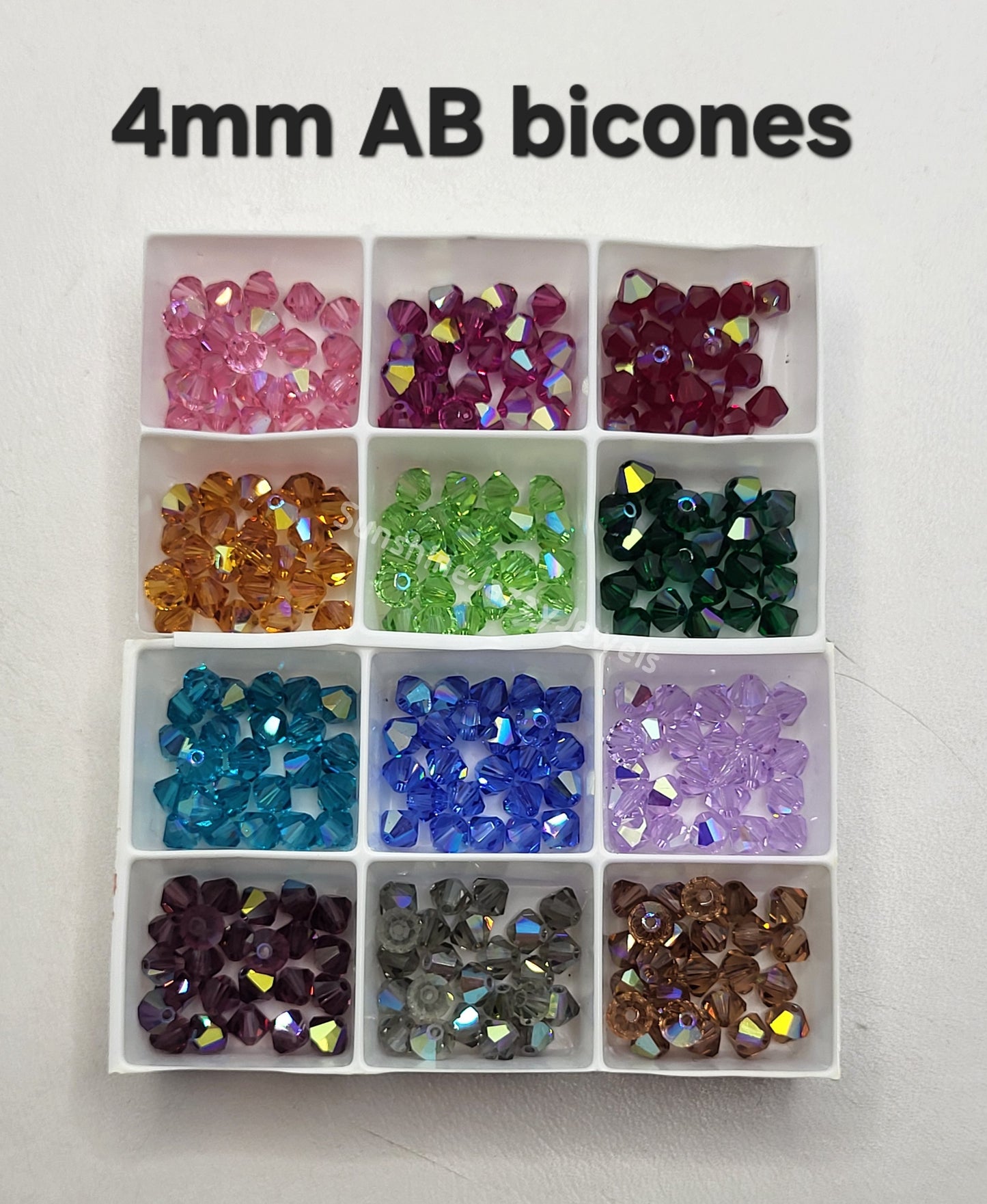 #5328 - Swarovski Crystal 4mm Bicone Beads w/ AB Finish