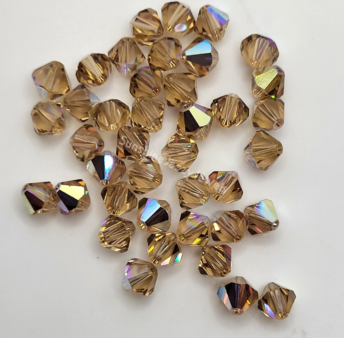 #5328 - Swarovski Crystal 4mm Bicone Beads w/ AB Finish