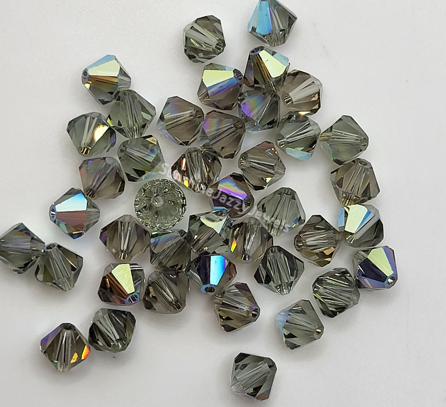 #5328 - Swarovski Crystal 6mm Bicone w/ AB Finish; 12pc per pack