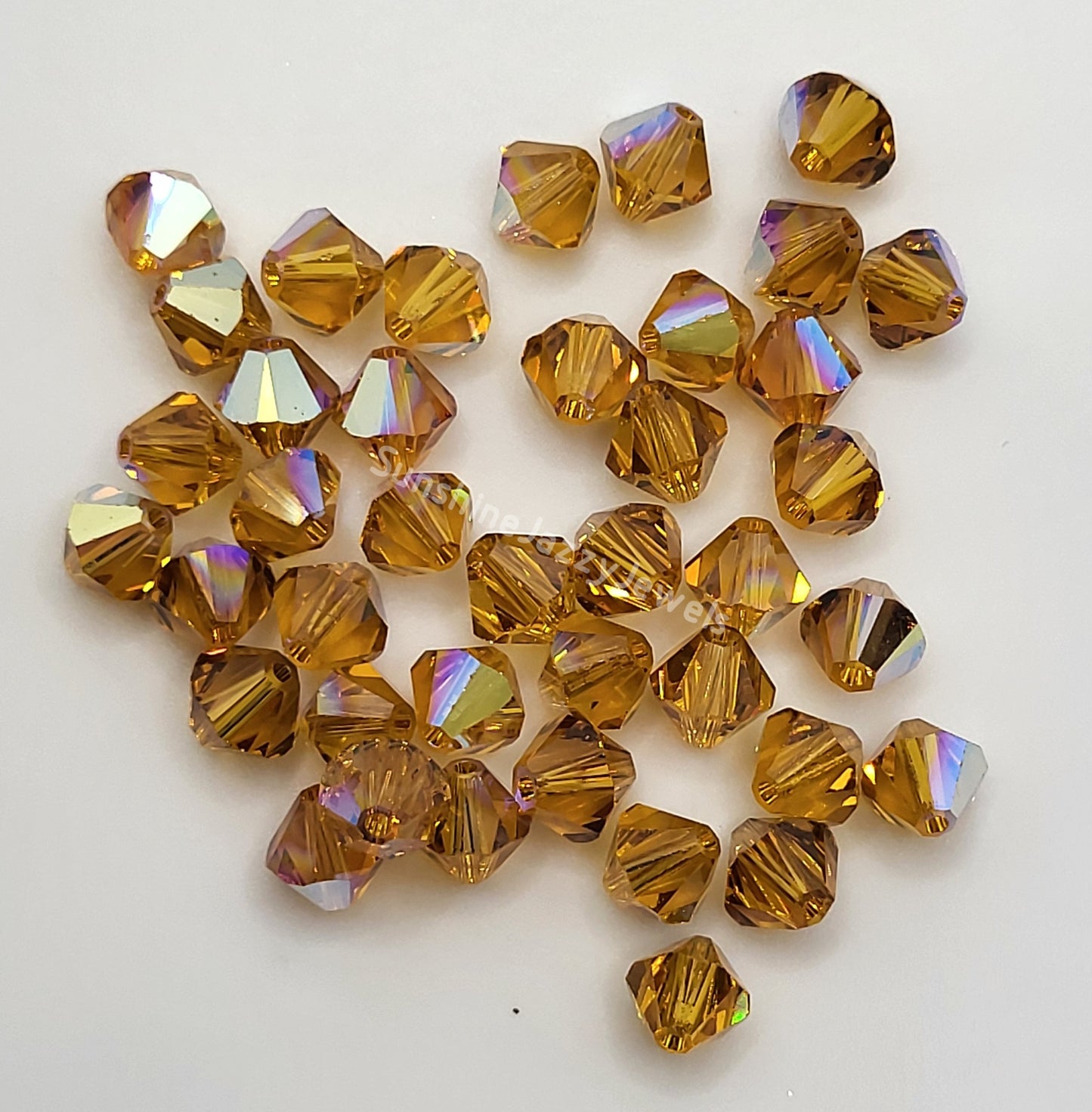 #5328 - Swarovski Crystal 4mm Bicone Beads w/ AB Finish