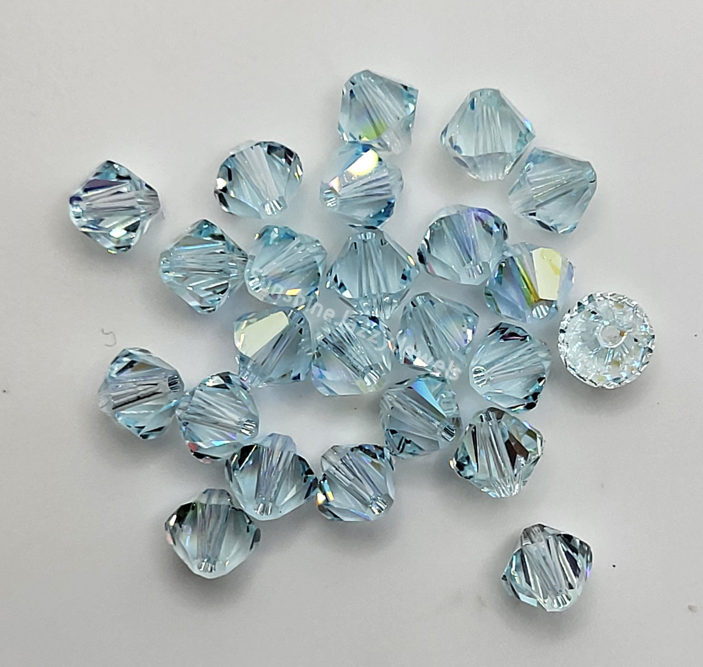 #5328 - Swarovski Crystal 4mm Bicone Beads w/ AB Finish