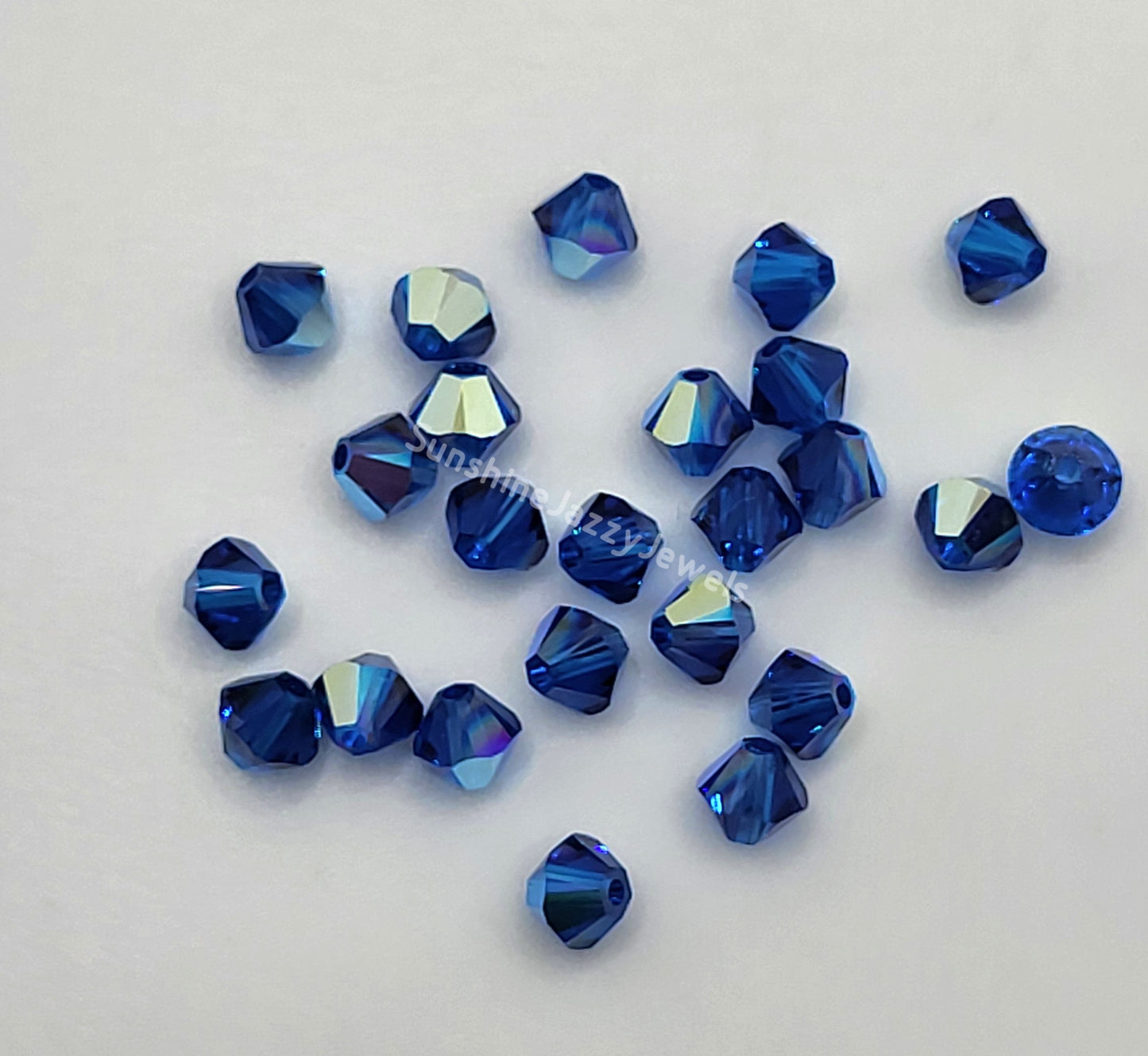 #5328 - 24pc Swarovski Crystal 3mm Capri Blue AB Bicone Beads; LAST ONE