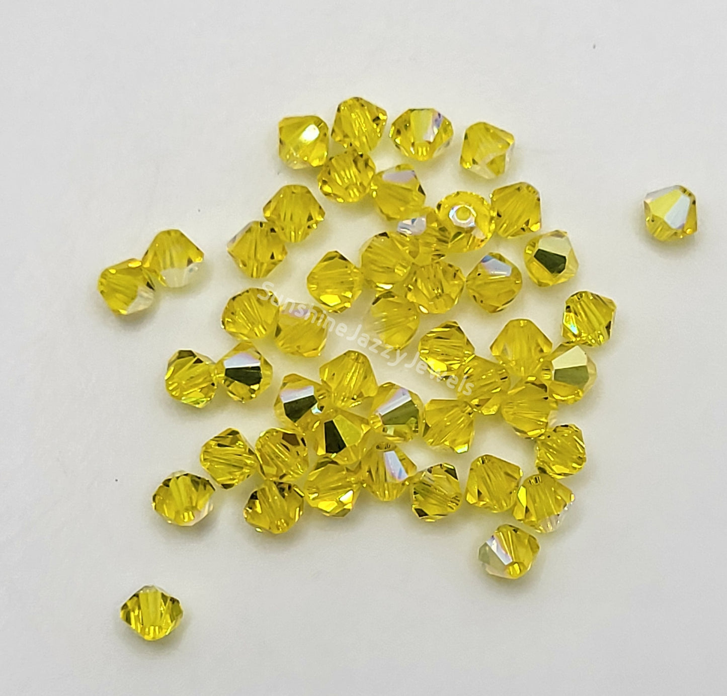 #5328 - Swarovski Crystal 4mm Bicone Beads w/ AB Finish