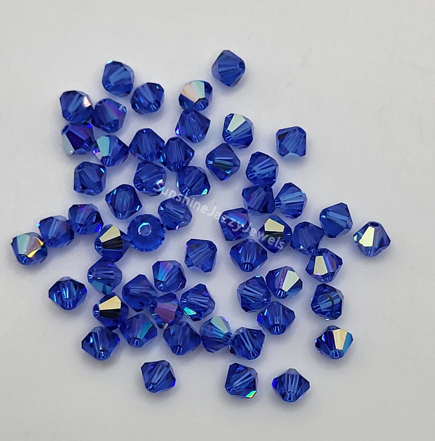 #5328 - Swarovski Crystal 4mm Bicone Beads w/ AB Finish
