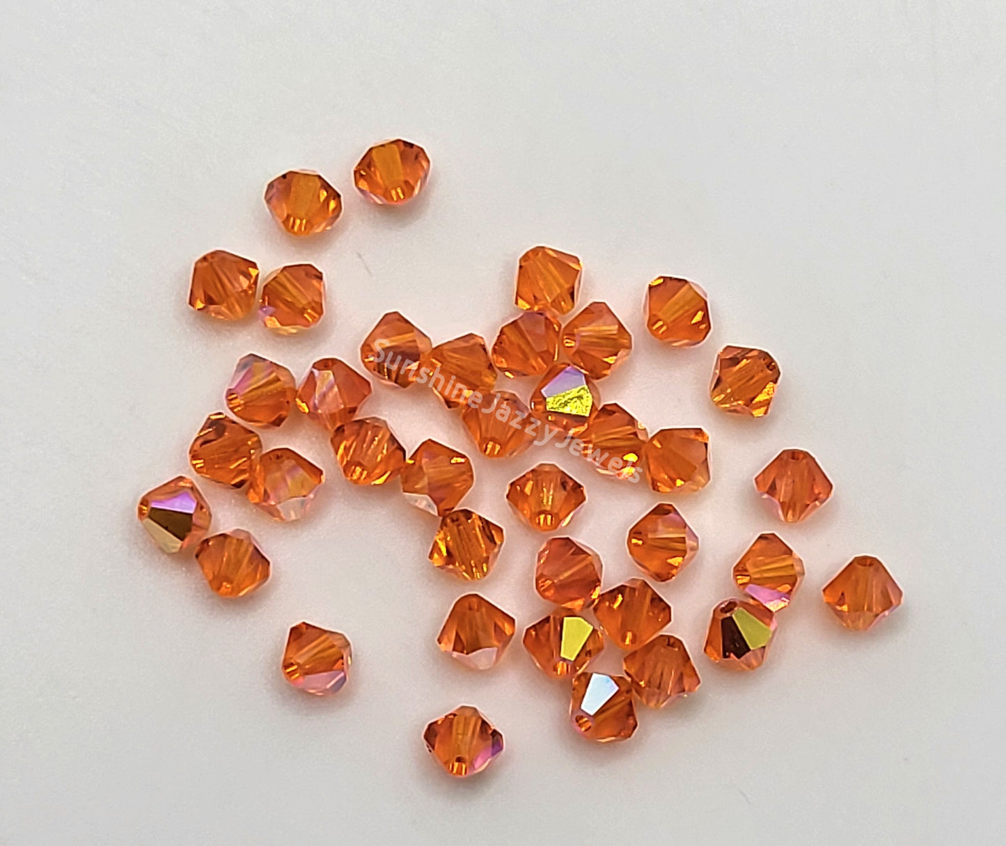 #5328 - Swarovski Crystal 4mm Bicone Beads w/ AB Finish