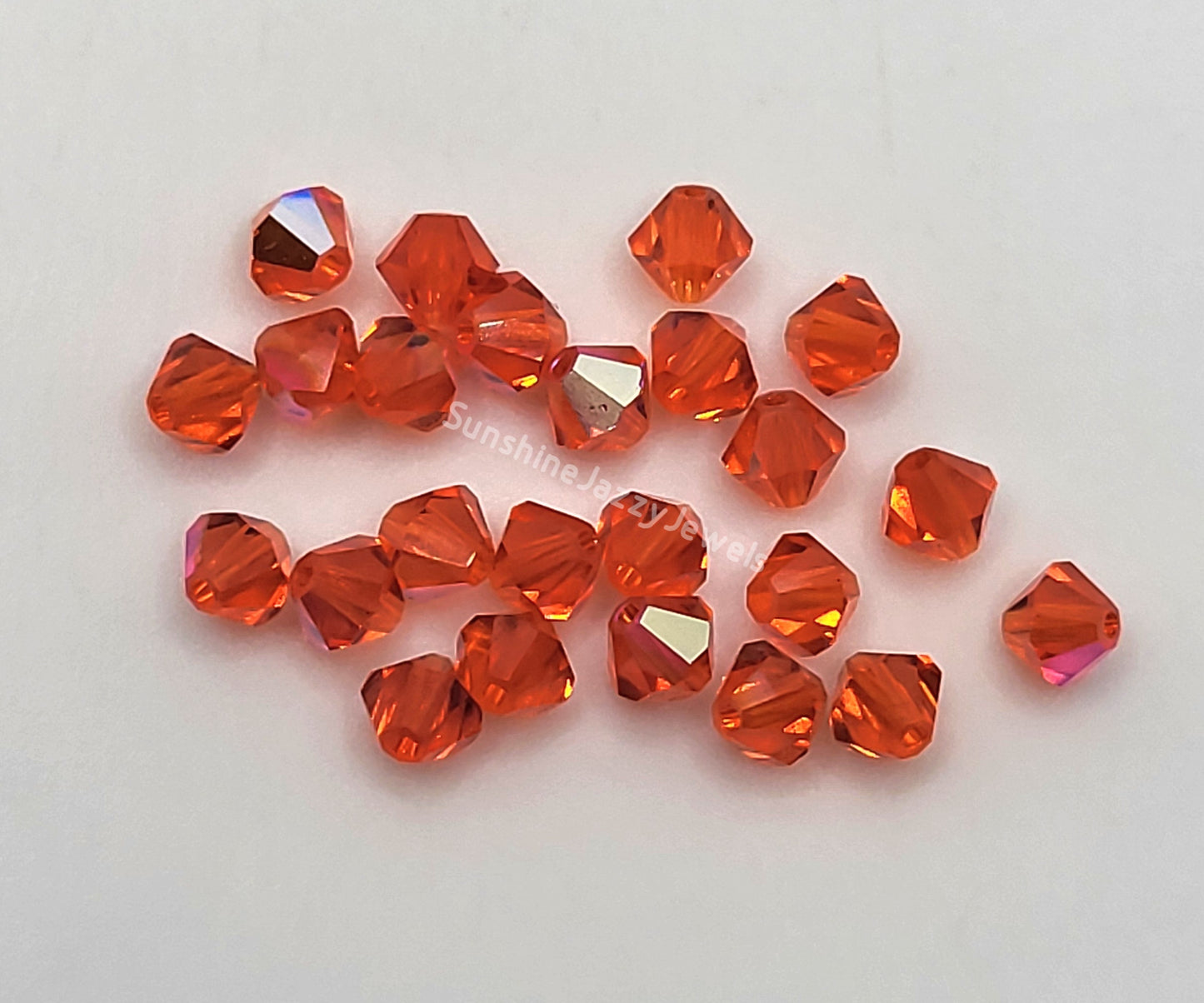 #5328 - Swarovski Crystal 4mm Bicone Beads w/ AB Finish