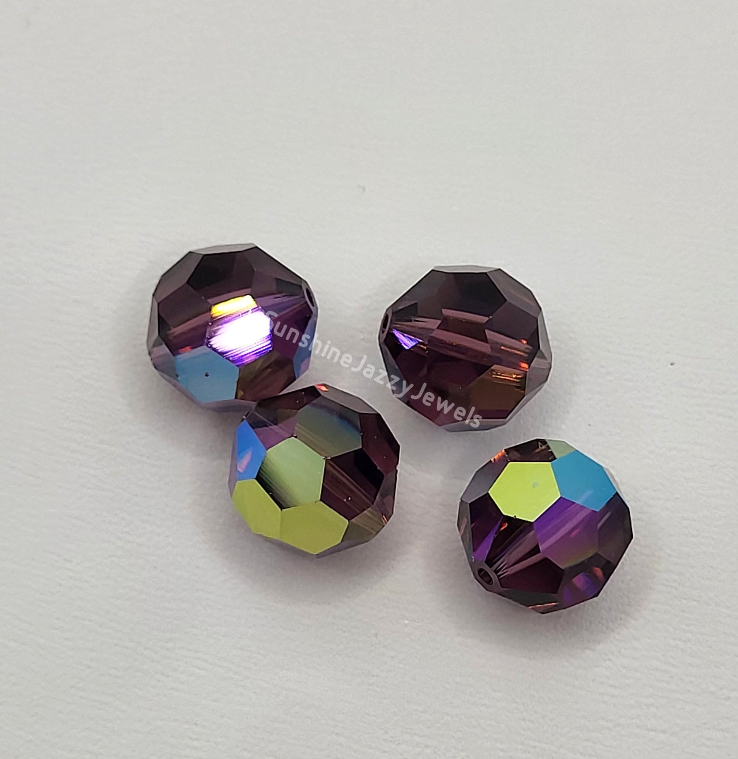 #5000 - Swarovski Crystal 12mm Faceted Round Beads w/ AB Finish