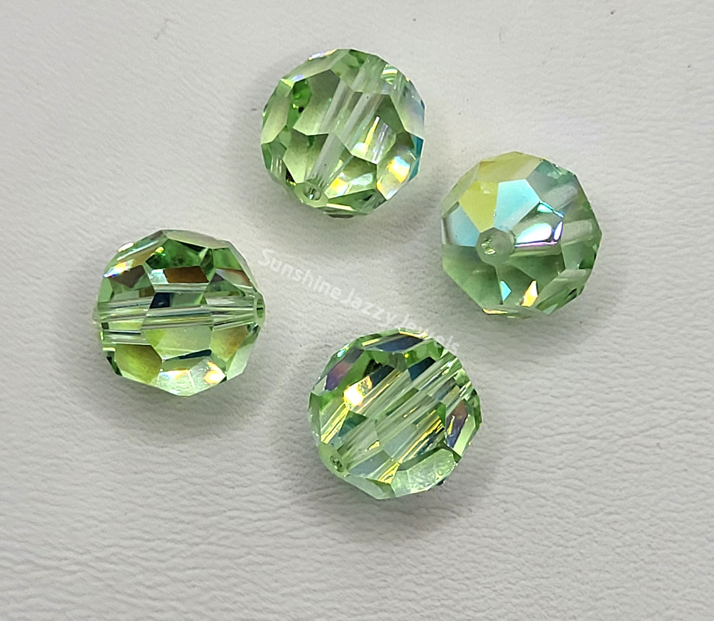 #5000 - Swarovski Crystal 12mm Faceted Round Beads w/ AB Finish
