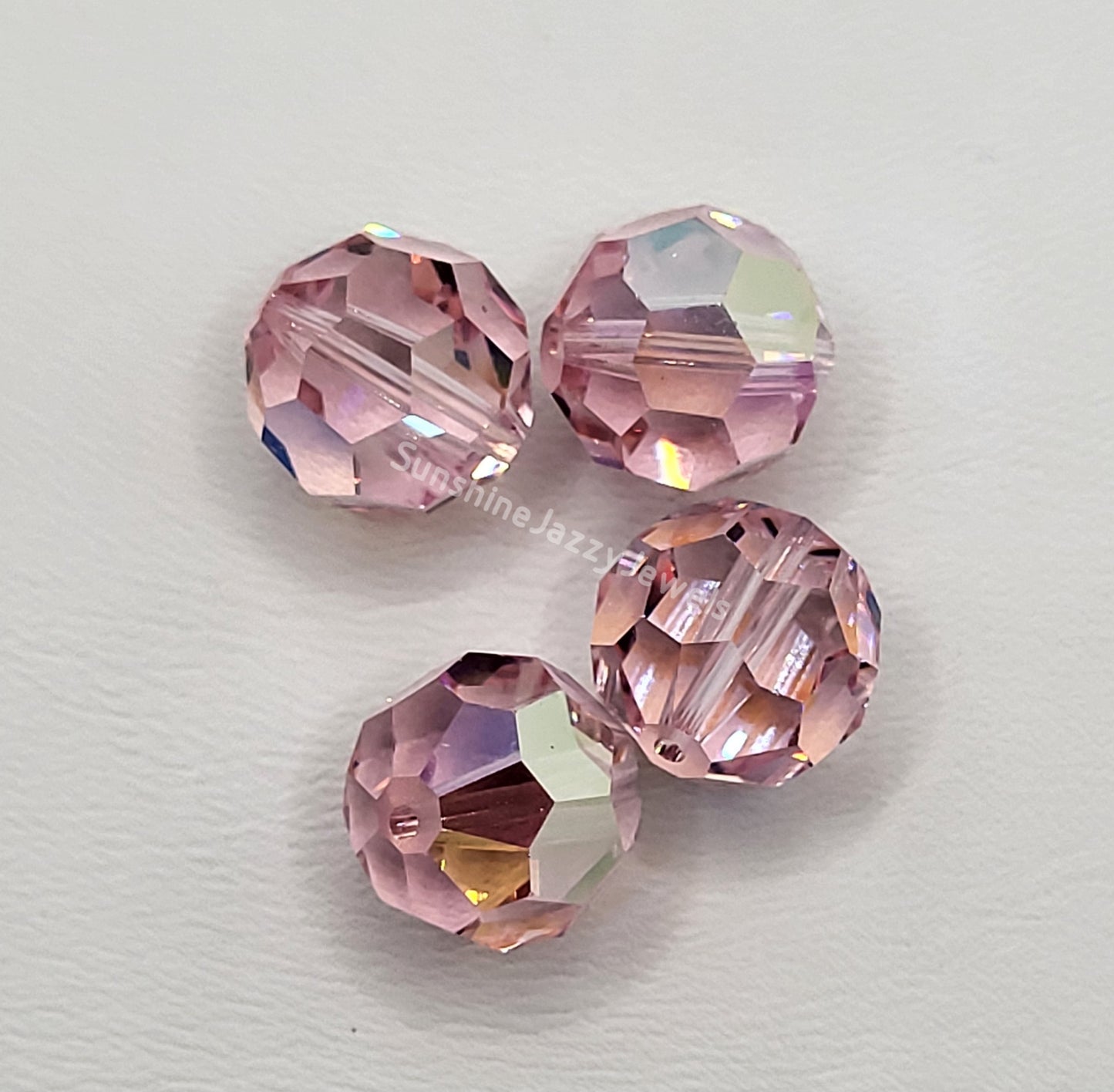 #5000 - Swarovski Crystal 12mm Faceted Round Beads w/ AB Finish