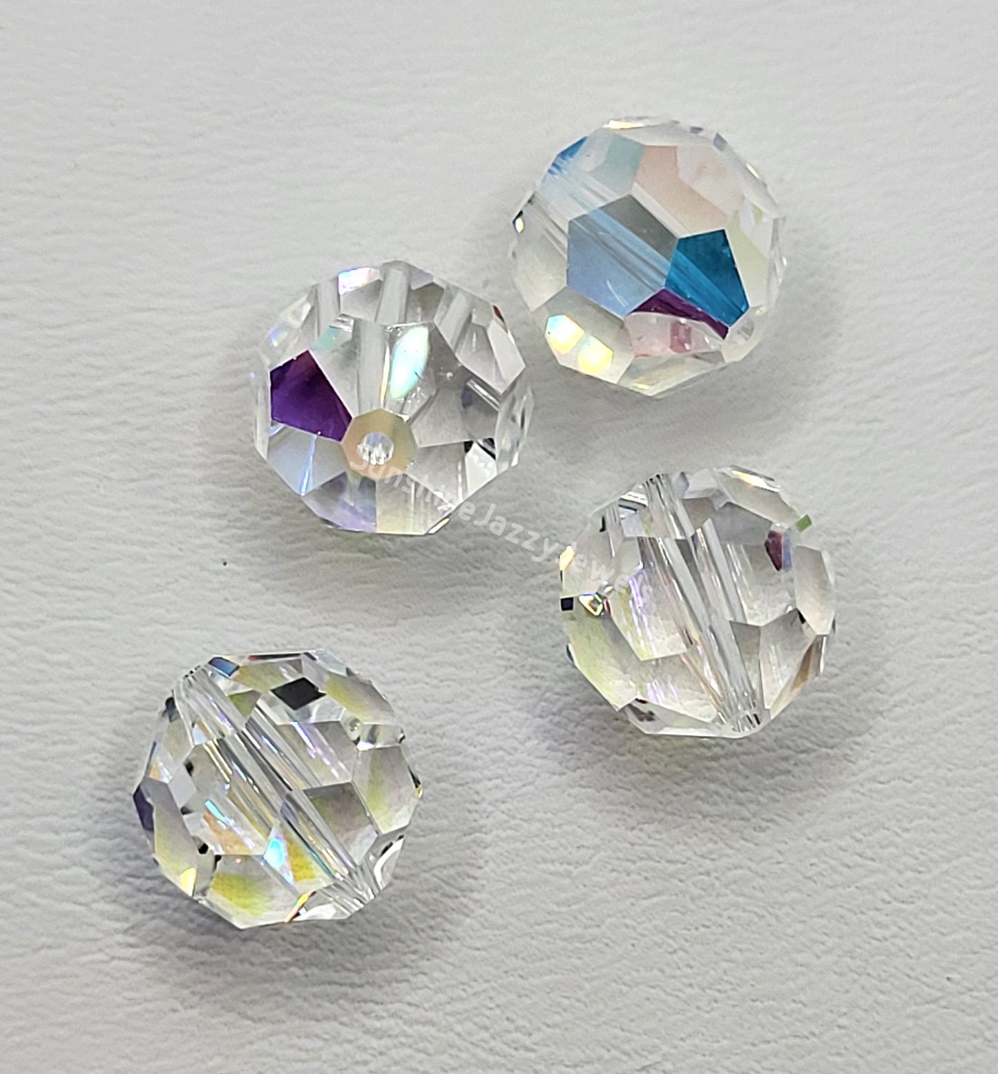 #5000 - Swarovski Crystal 12mm Faceted Round Beads w/ AB Finish