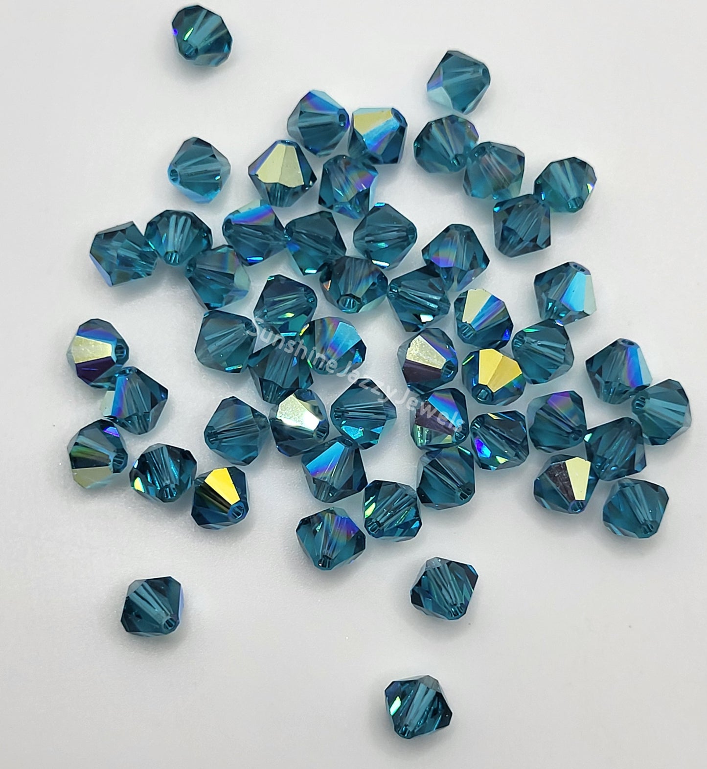 #5328 - Swarovski Crystal 6mm Bicone w/ AB Finish; 12pc per pack