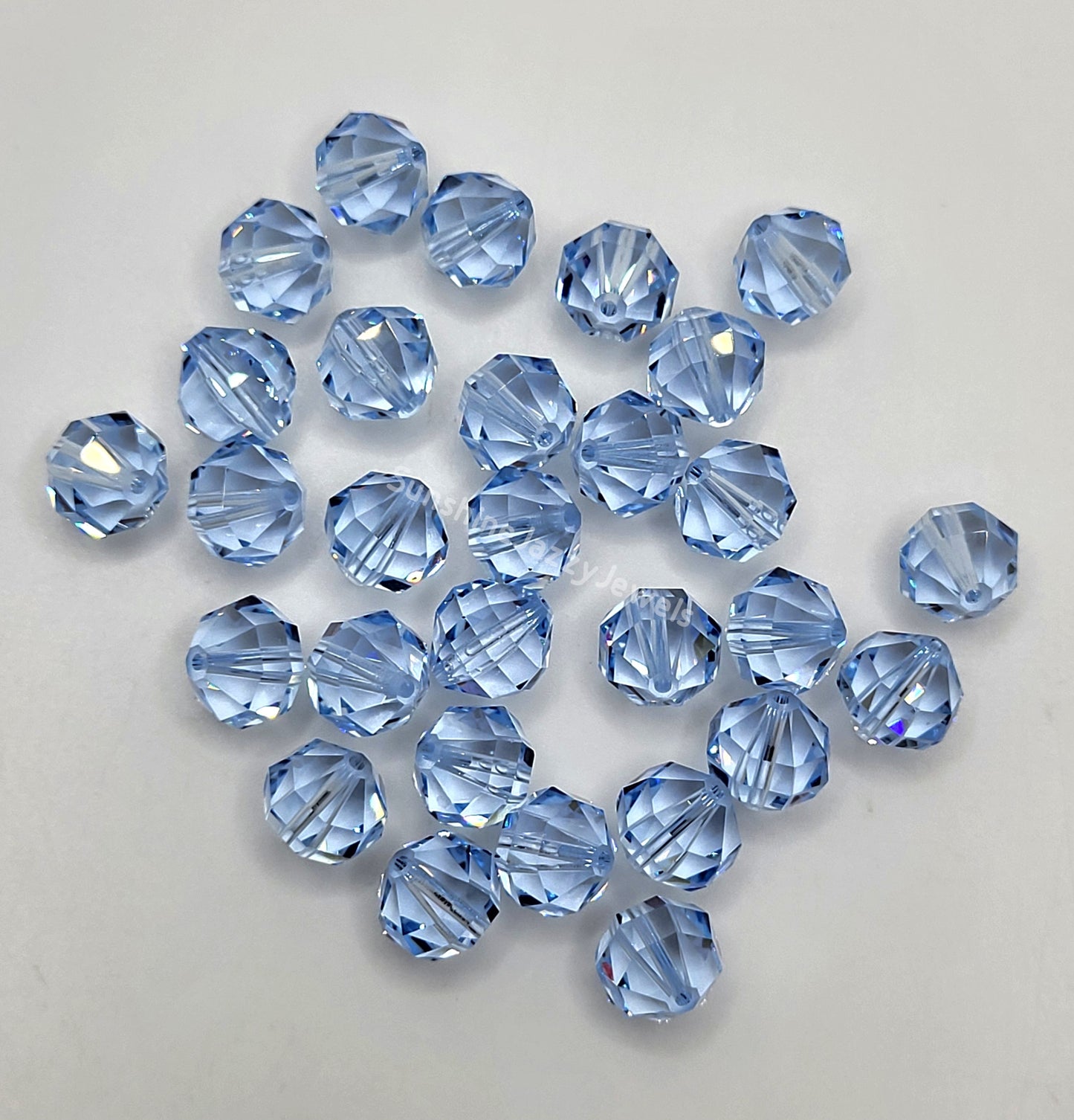 #5004 - Swarovski Crystal Lavender 9mm Geometric Round Beads