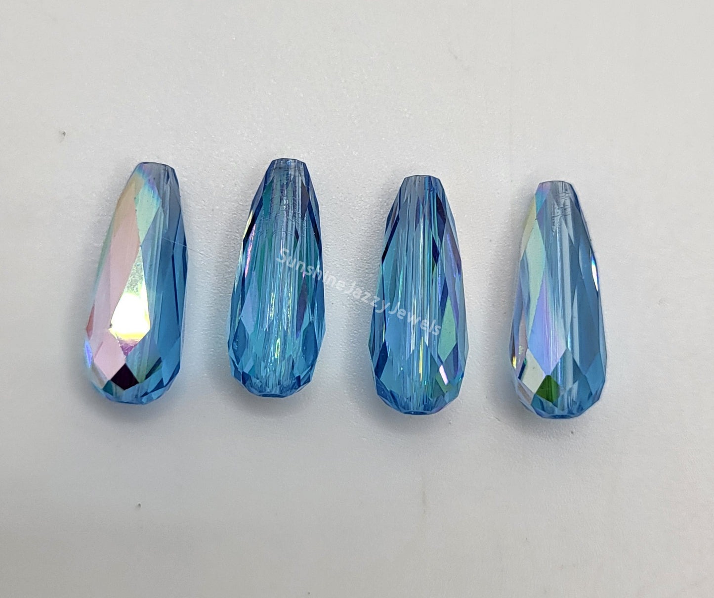 #5505 - Swarovski Crystal Aquamarine AB 15x6mm Thin Teardrop Beads