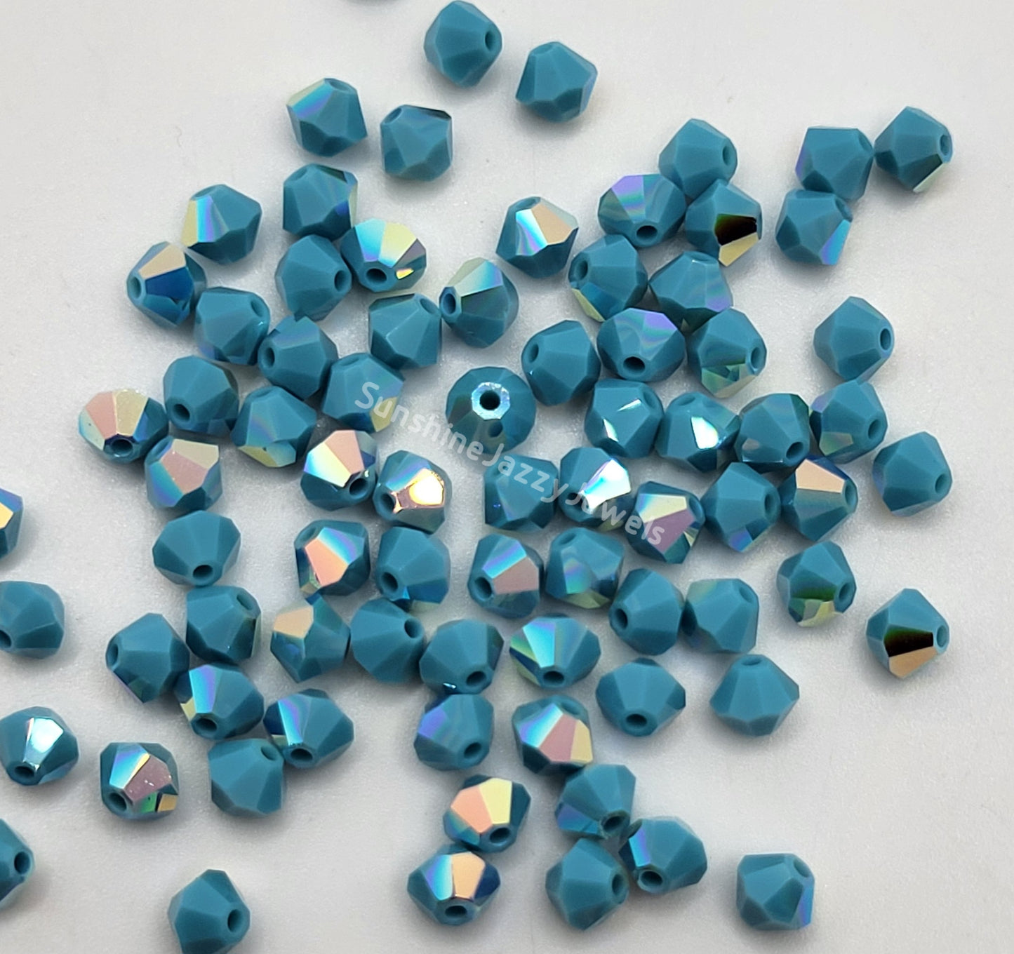#5328 - Swarovski Crystal 4mm Bicone Beads w/ AB Finish; 24pc per pack