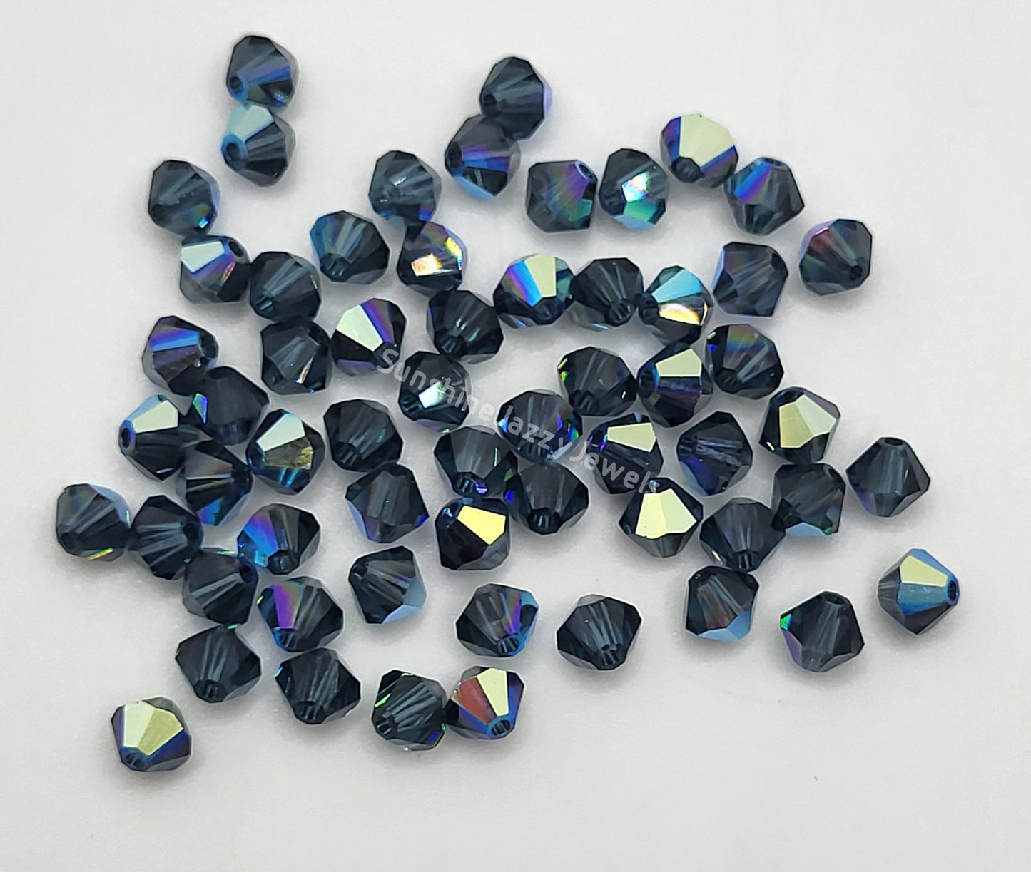 #5328 - Swarovski Crystal 4mm Bicone Beads w/ AB Finish; 24pc per pack