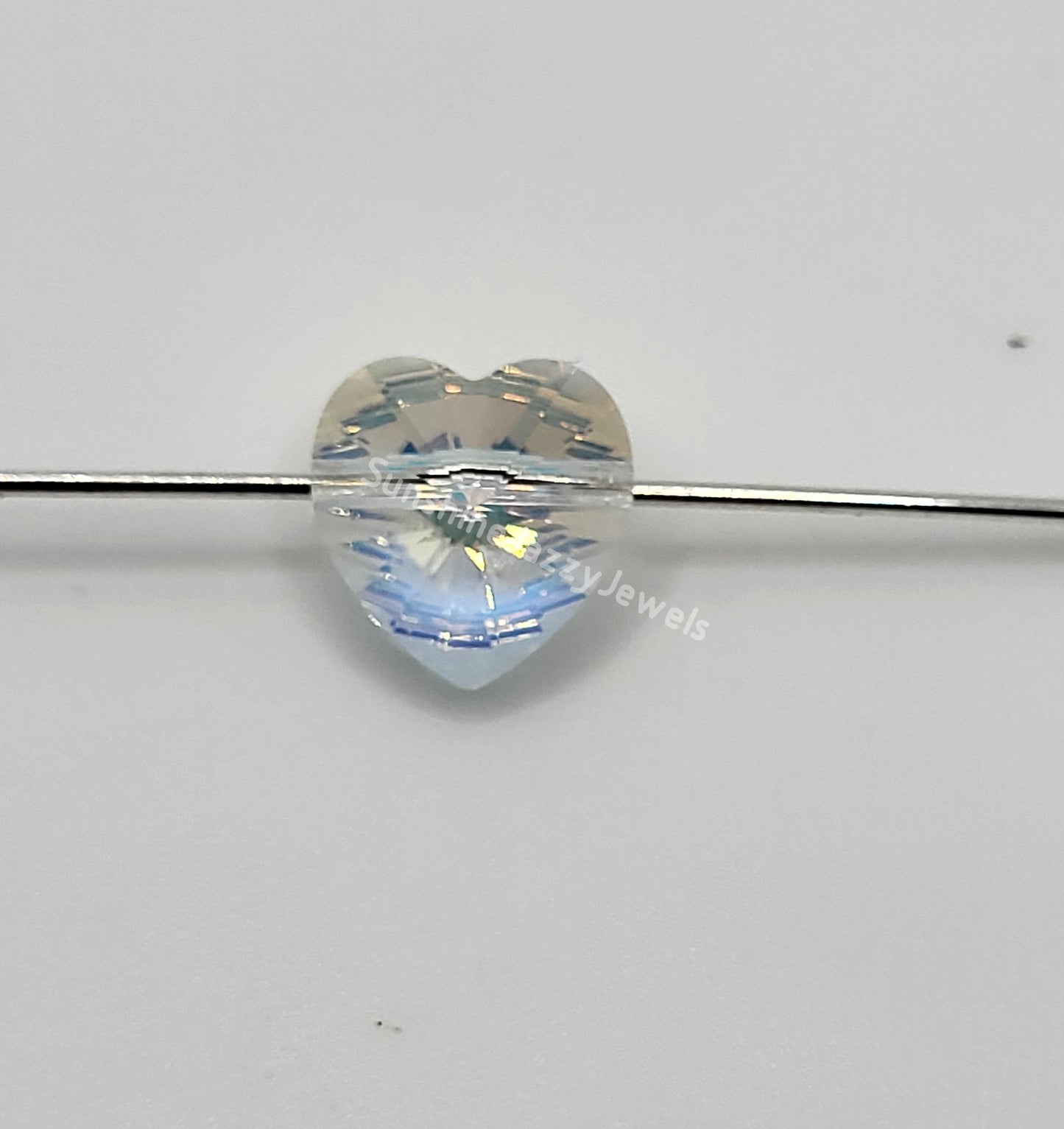 #5742 - Swarovski Crystal Clear AB 10mm Heart Beads; 6pc per pack