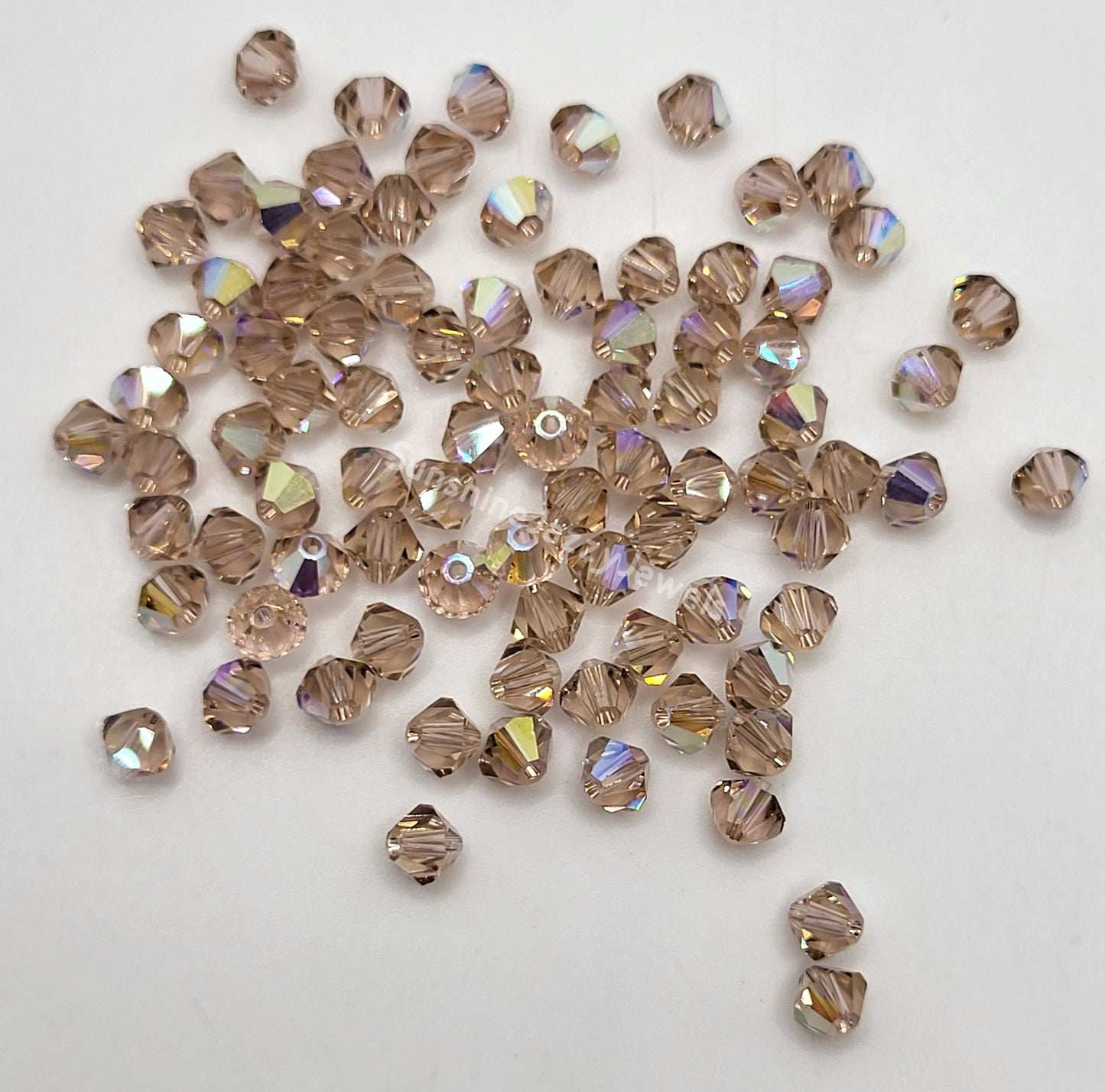 #5328 - Swarovski Crystal 4mm Bicone Beads w/ AB Finish; 24pc per pack