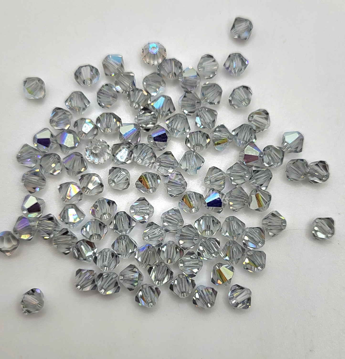 #5328 - Swarovski Crystal 4mm Bicone Beads - Crystal Effects; 24pc per pack