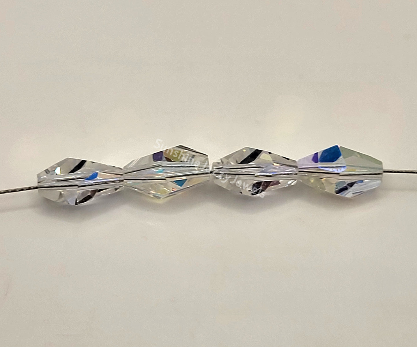 #5203 - Swarovski Crystal Clear AB Polygon Bead; 2 Sizes; 4pc per pack
