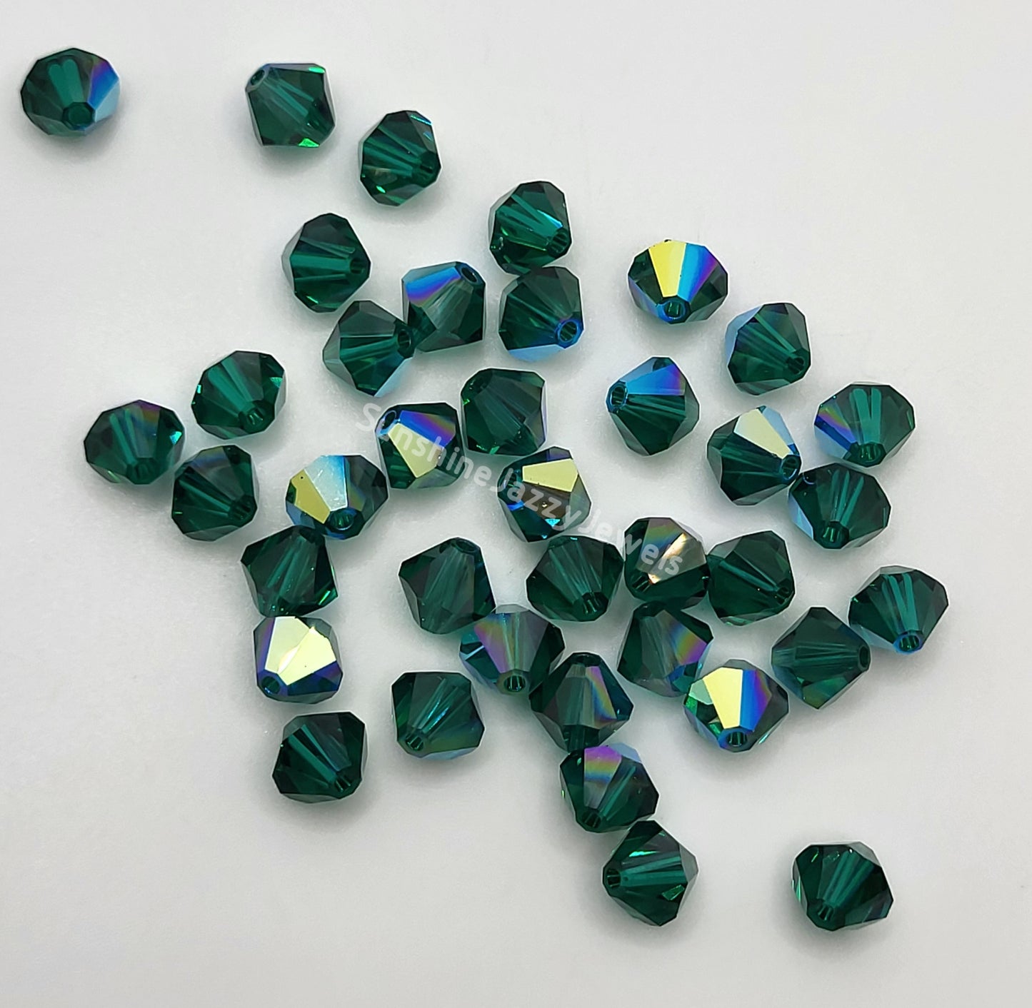 #5328 - Swarovski Crystal 6mm Bicone w/ AB Finish; 12pc per pack