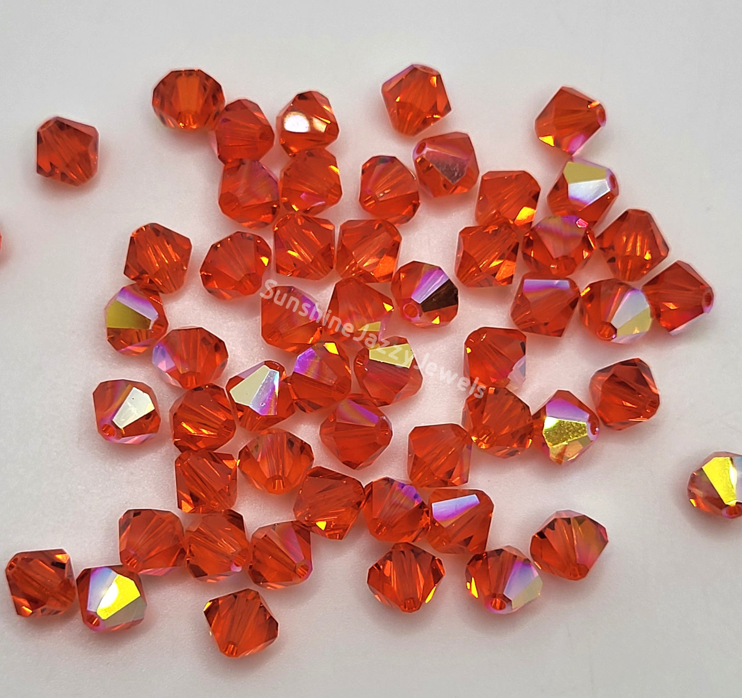 #5328 - Swarovski Crystal 6mm Bicone w/ AB Finish; 12pc per pack