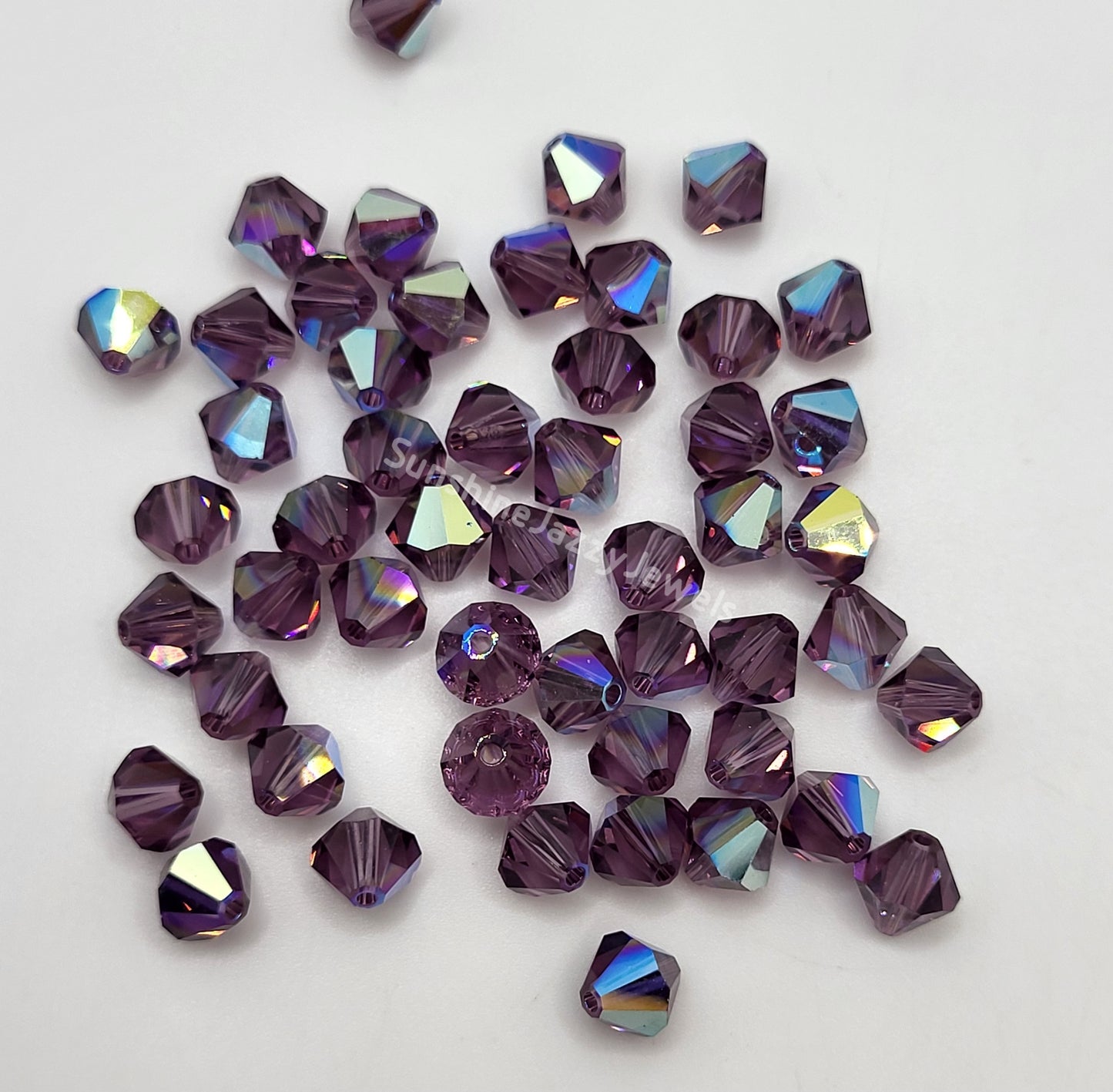 #5328 - Swarovski Crystal 4mm Bicone Beads w/ AB Finish; 24pc per pack