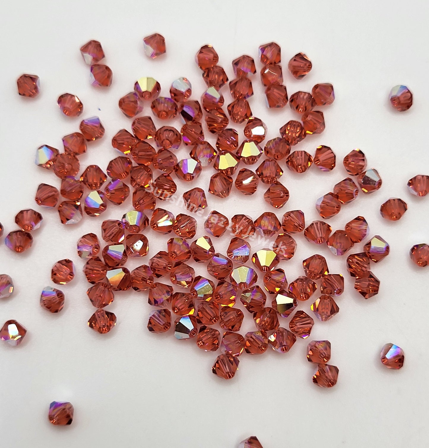 #5328 - Swarovski Crystal 4mm Bicone Beads w/ AB Finish; 24pc per pack