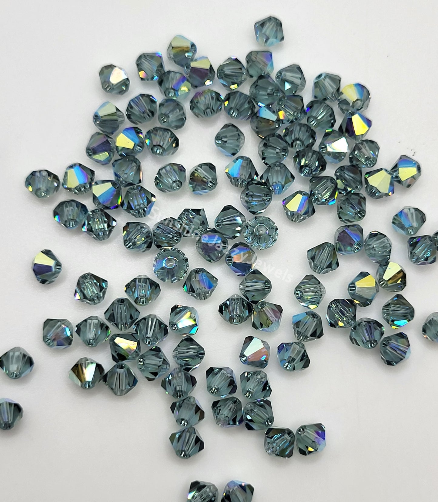 #5328 - Swarovski Crystal 4mm Bicone Beads w/ AB Finish; 24pc per pack