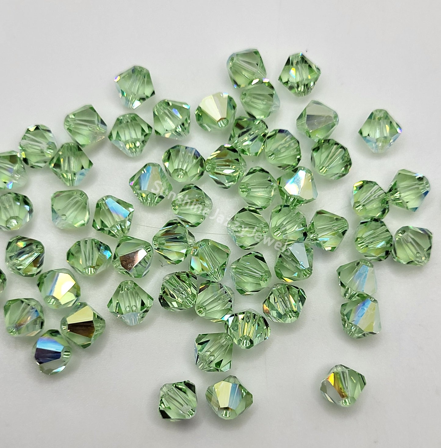 #5328 - Swarovski Crystal 6mm Bicone w/ AB Finish; 12pc per pack