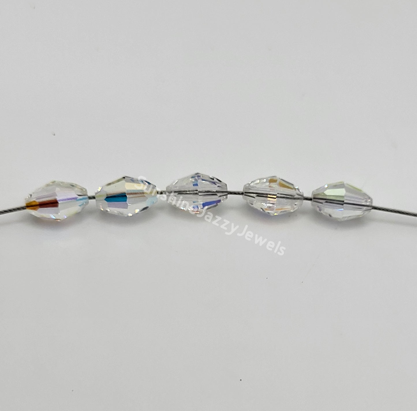 #5200 - Swarovski Crystal Clear AB Faceted Oval Beads; 7 Sizes
